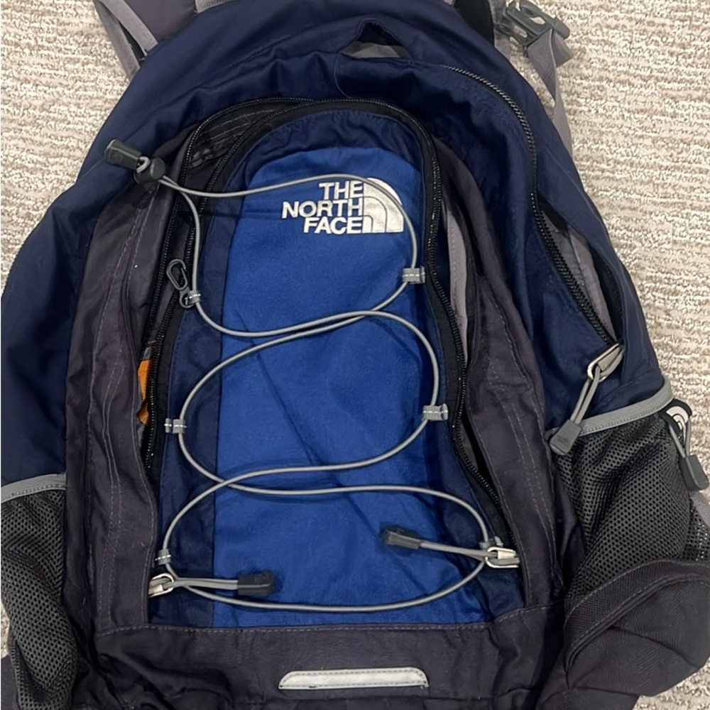 The North Face Blue and Black Backpack